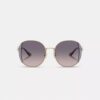 Runde Sonnenbrille aus Metall mit Horse and Carriage-Motiv
