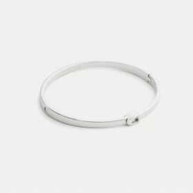 Schlanker Armreif mit Scharnier im charakteristischen Design