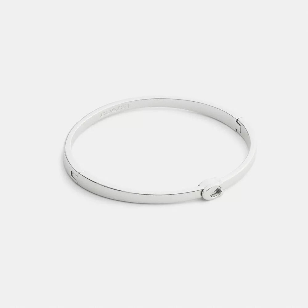 Schlanker Armreif mit Scharnier im charakteristischen Design