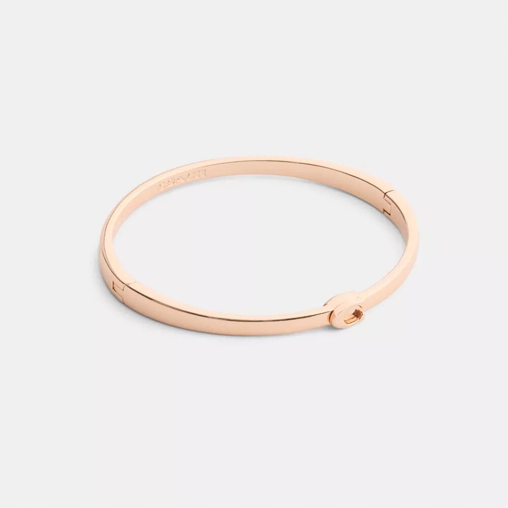 Schlanker Armreif mit Scharnier im charakteristischen Design