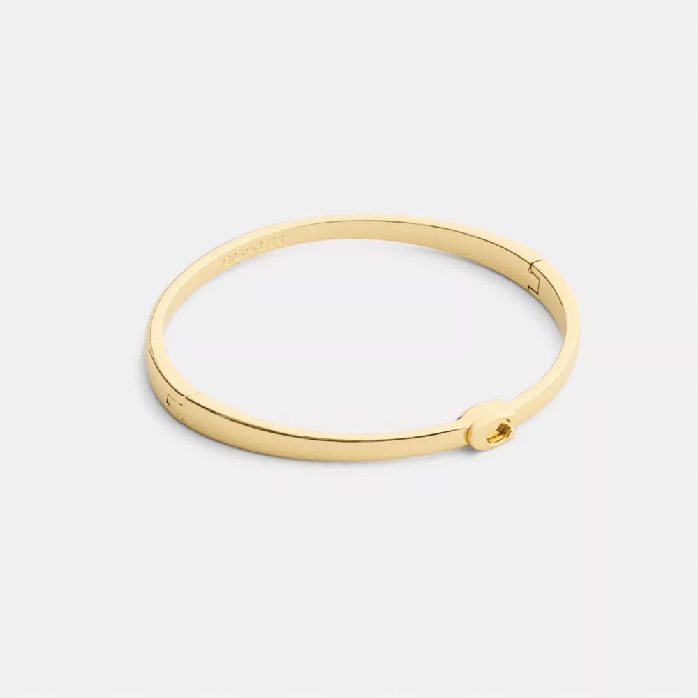 Schlanker Armreif mit Scharnier im charakteristischen Design