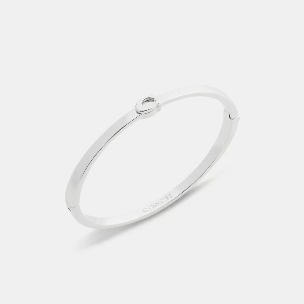 Schlanker Armreif mit Scharnier im charakteristischen Design