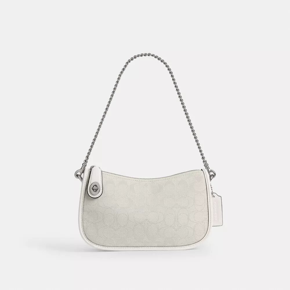 Swinger-Taschen aus charakteristischem Jacquard