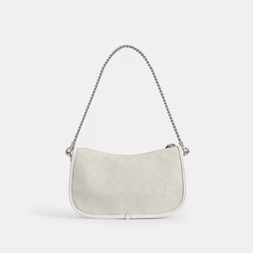 Swinger-Taschen aus charakteristischem Jacquard