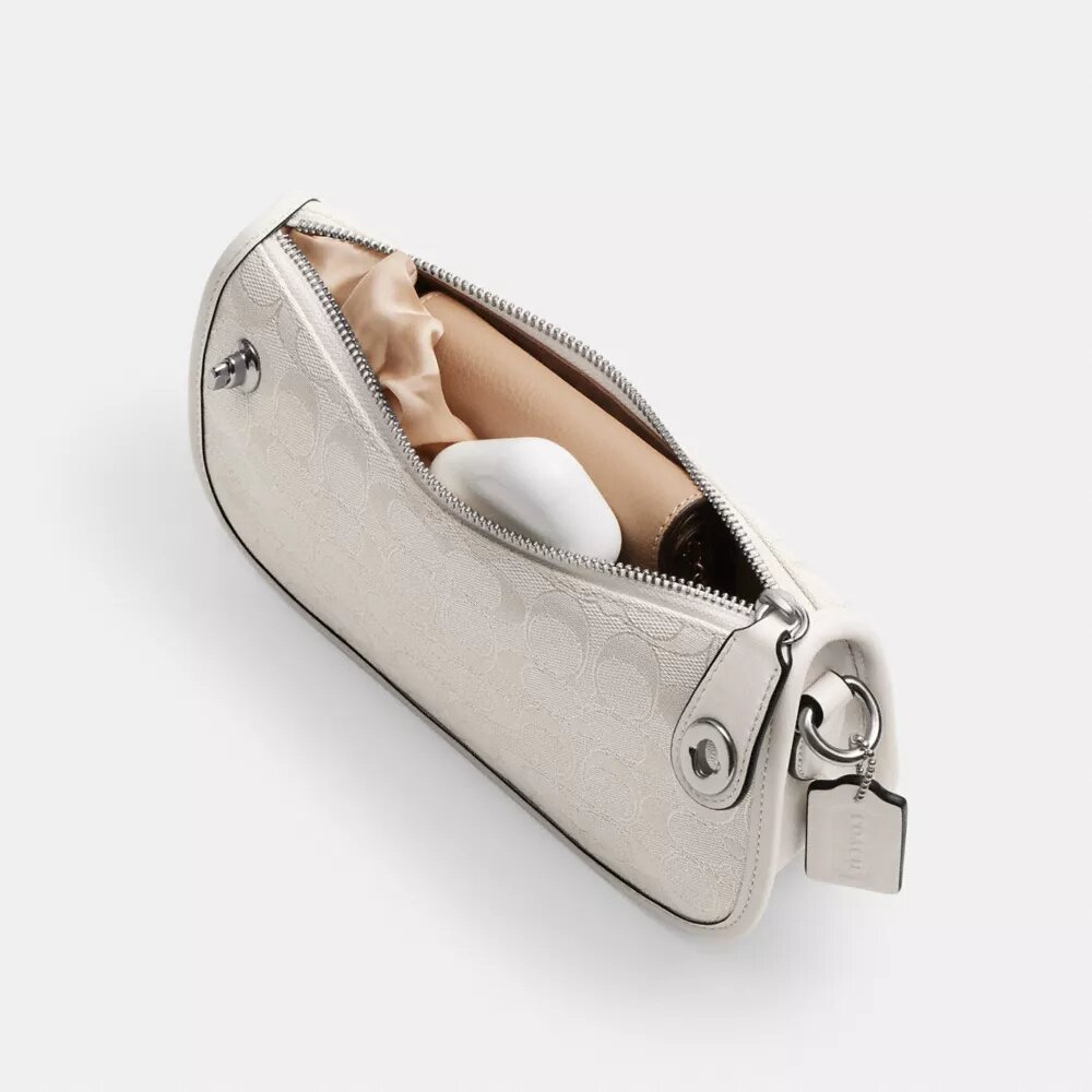 Swinger-Taschen aus charakteristischem Jacquard