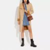 Tabby-Schultertasche 26 aus Signature Canvas