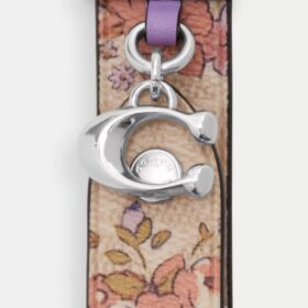 Taschenanhänger mit Druckknopfverschluss und Blumenmuster