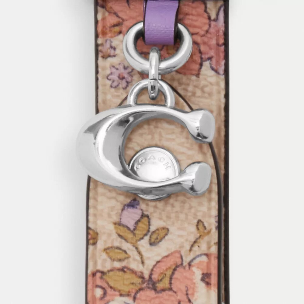 Taschenanhänger mit Druckknopfverschluss und Blumenmuster