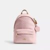 Taylor-Rucksack in kleiner Ausführung aus Signature Canvas mit Anhängern