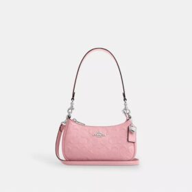 Teri Mini-Umhängetasche aus Signature-Leder mit Herz-Anhänger