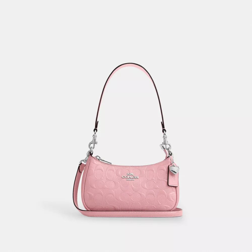 Teri Mini-Umhängetasche aus Signature-Leder mit Herz-Anhänger