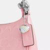 Teri Mini-Umhängetasche aus Signature-Leder mit Herz-Anhänger
