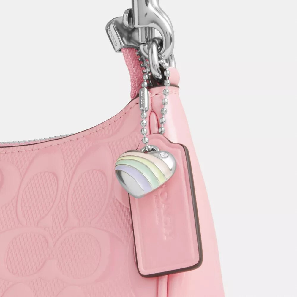 Teri Mini-Umhängetasche aus Signature-Leder mit Herz-Anhänger