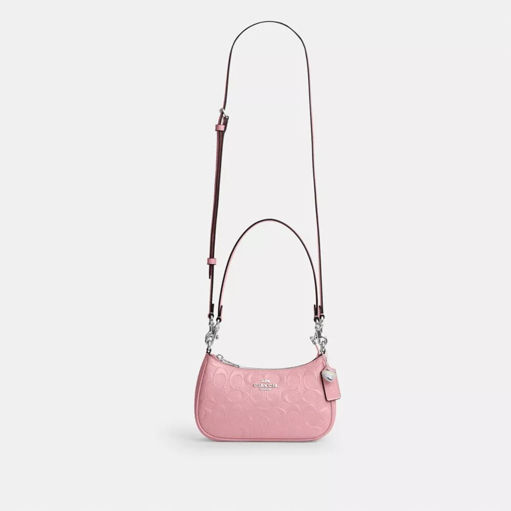 Teri Mini-Umhängetasche aus Signature-Leder mit Herz-Anhänger
