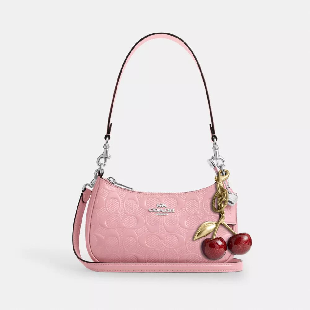 Teri Mini-Umhängetasche aus Signature-Leder mit Herz-Anhänger