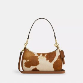 Teri-Schultertasche aus Haarkalbsleder mit Kuhmuster