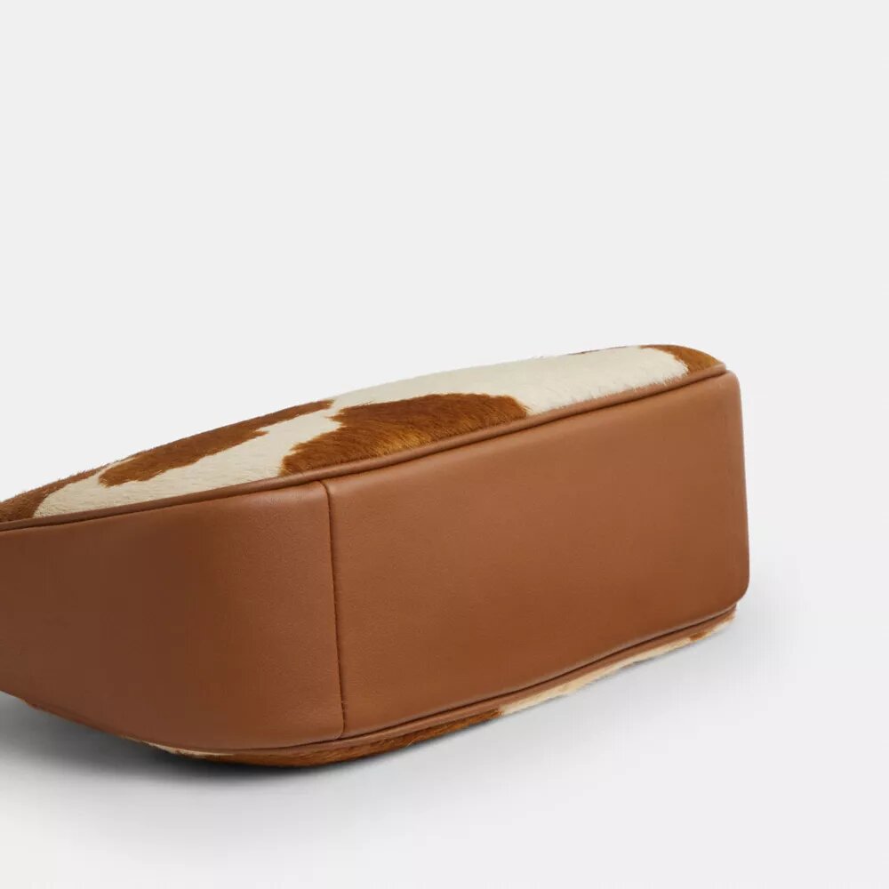 Teri-Schultertasche aus Haarkalbsleder mit Kuhmuster