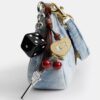 Teri-Schultertasche aus Loved Denim mit Anhängern