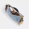 Teri-Schultertasche aus Loved Denim mit Anhängern