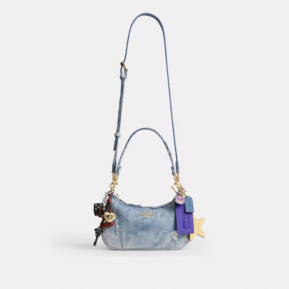 Teri-Schultertasche aus Loved Denim mit Anhängern