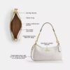 Teri-Schultertasche aus Signature Canvas