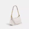 Teri-Schultertasche aus Signature Canvas