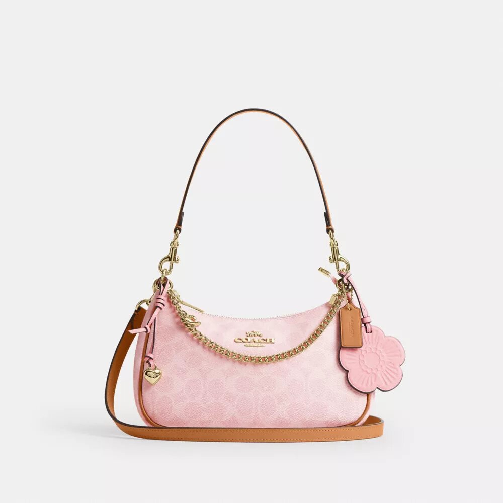 Teri-Schultertasche aus Signature Canvas mit Anhängern