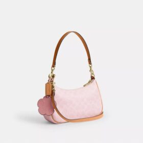 Teri-Schultertasche aus Signature Canvas mit Anhängern
