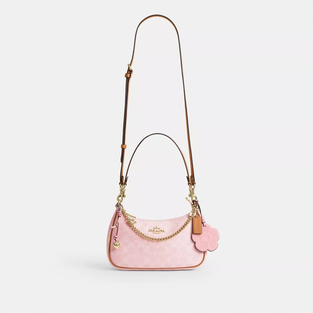 Teri-Schultertasche aus Signature Canvas mit Anhängern
