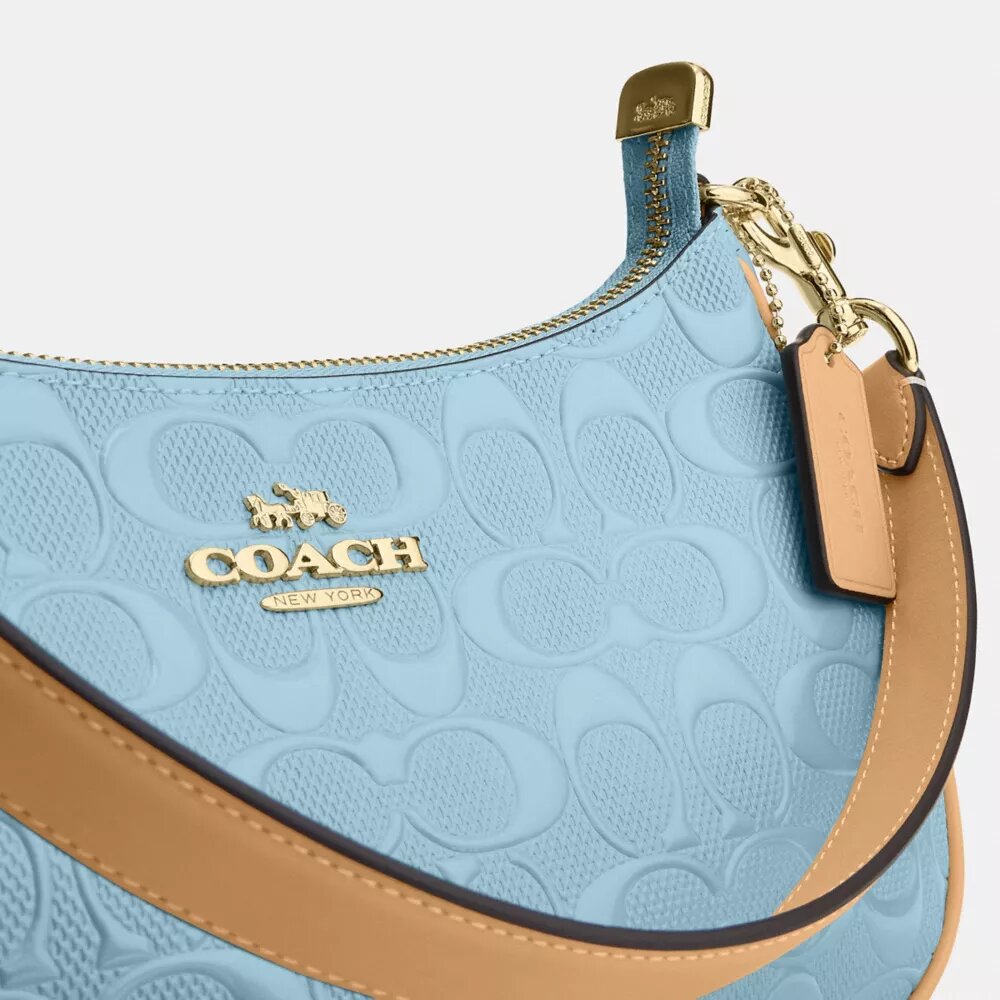 Teri-Schultertasche aus Signature-Leder
