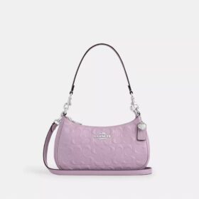 Teri-Schultertasche aus Signature-Leder mit Herz-Anhänger