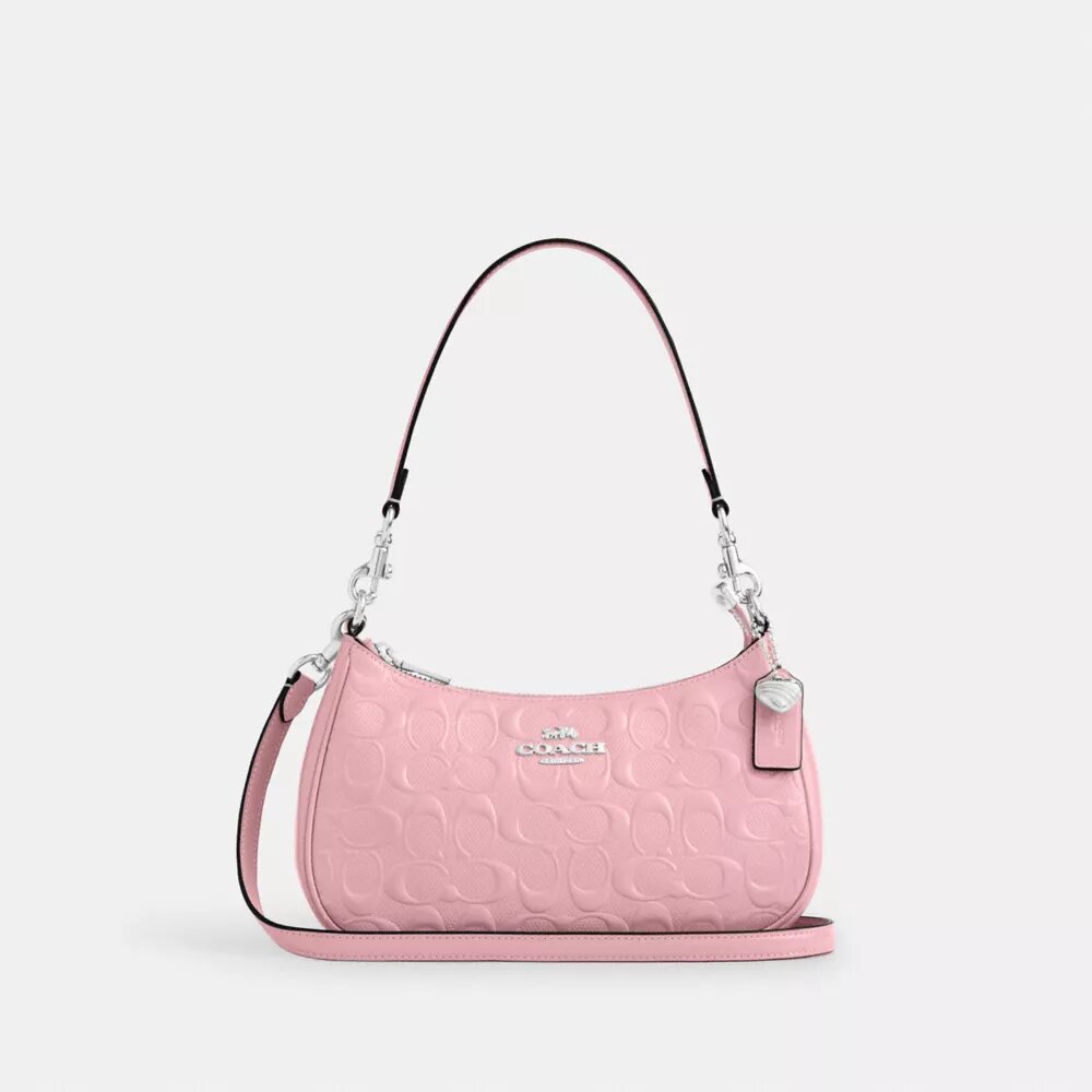 Teri-Schultertasche aus Signature-Leder mit Herz-Anhänger