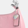 Teri-Schultertasche aus Signature-Leder mit Herz-Anhänger