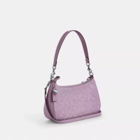 Teri-Schultertasche aus Signature-Leder mit Herz-Anhänger