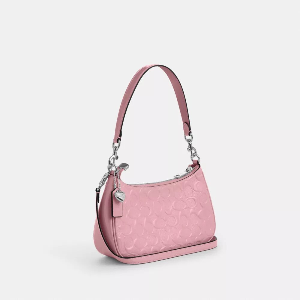 Teri-Schultertasche aus Signature-Leder mit Herz-Anhänger