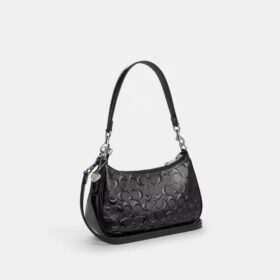 Teri-Schultertasche aus Signature-Leder mit Herz-Anhänger