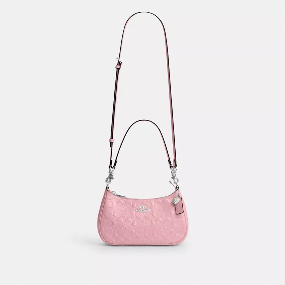 Teri-Schultertasche aus Signature-Leder mit Herz-Anhänger