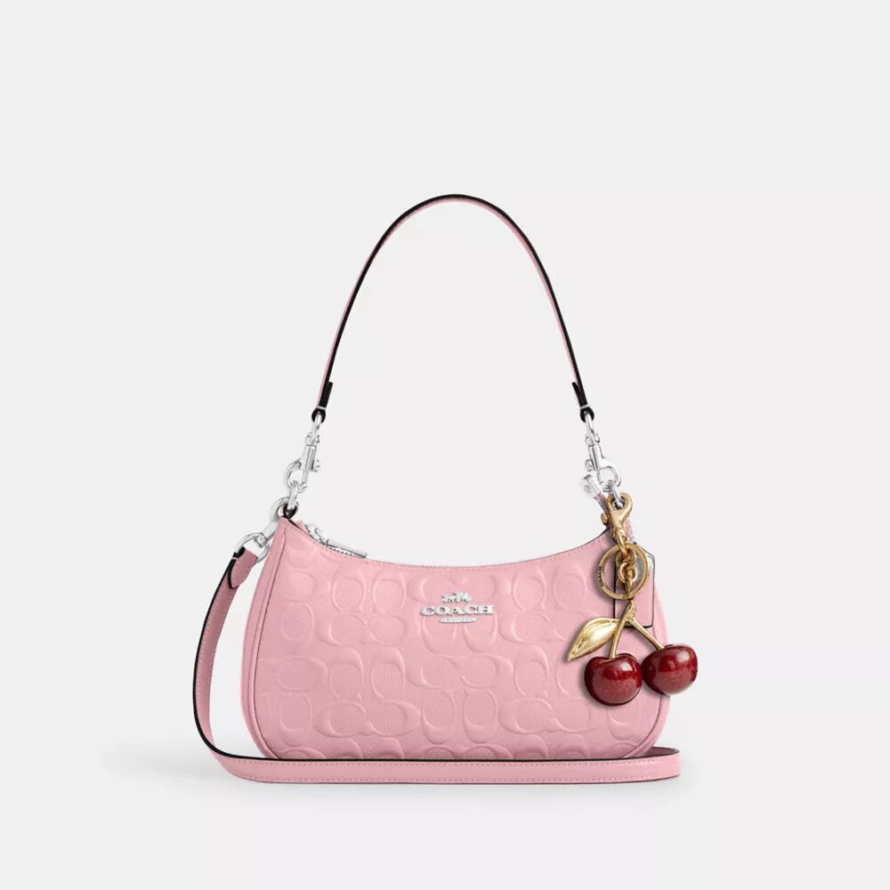 Teri-Schultertasche aus Signature-Leder mit Herz-Anhänger
