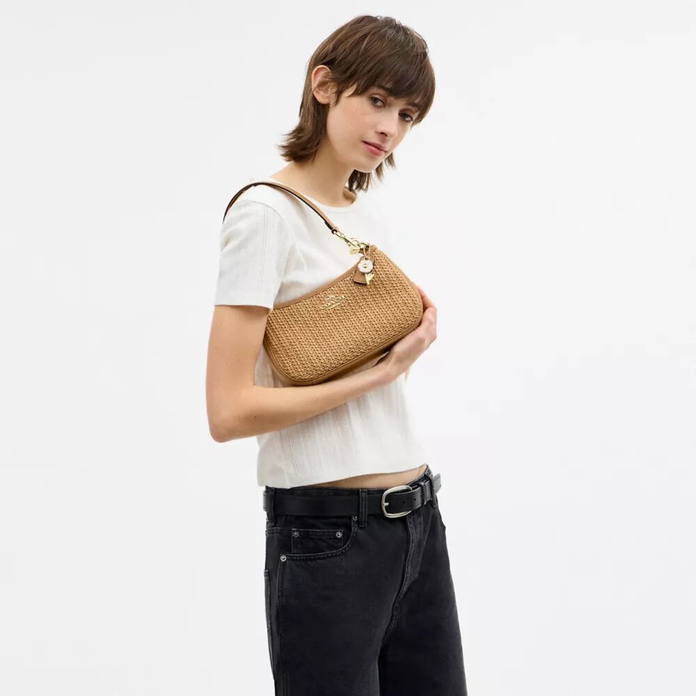 Teri-Schultertasche mit Anhänger