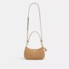 Teri-Schultertasche mit Anhänger