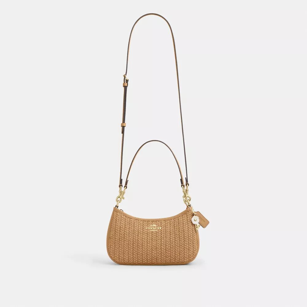 Teri-Schultertasche mit Anhänger
