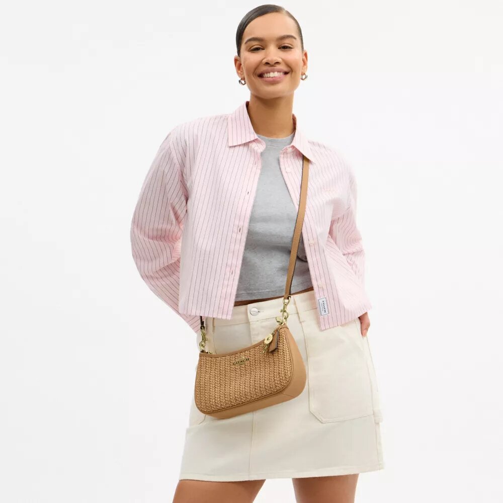Teri-Schultertasche mit Anhänger