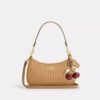 Teri-Schultertasche mit Anhänger