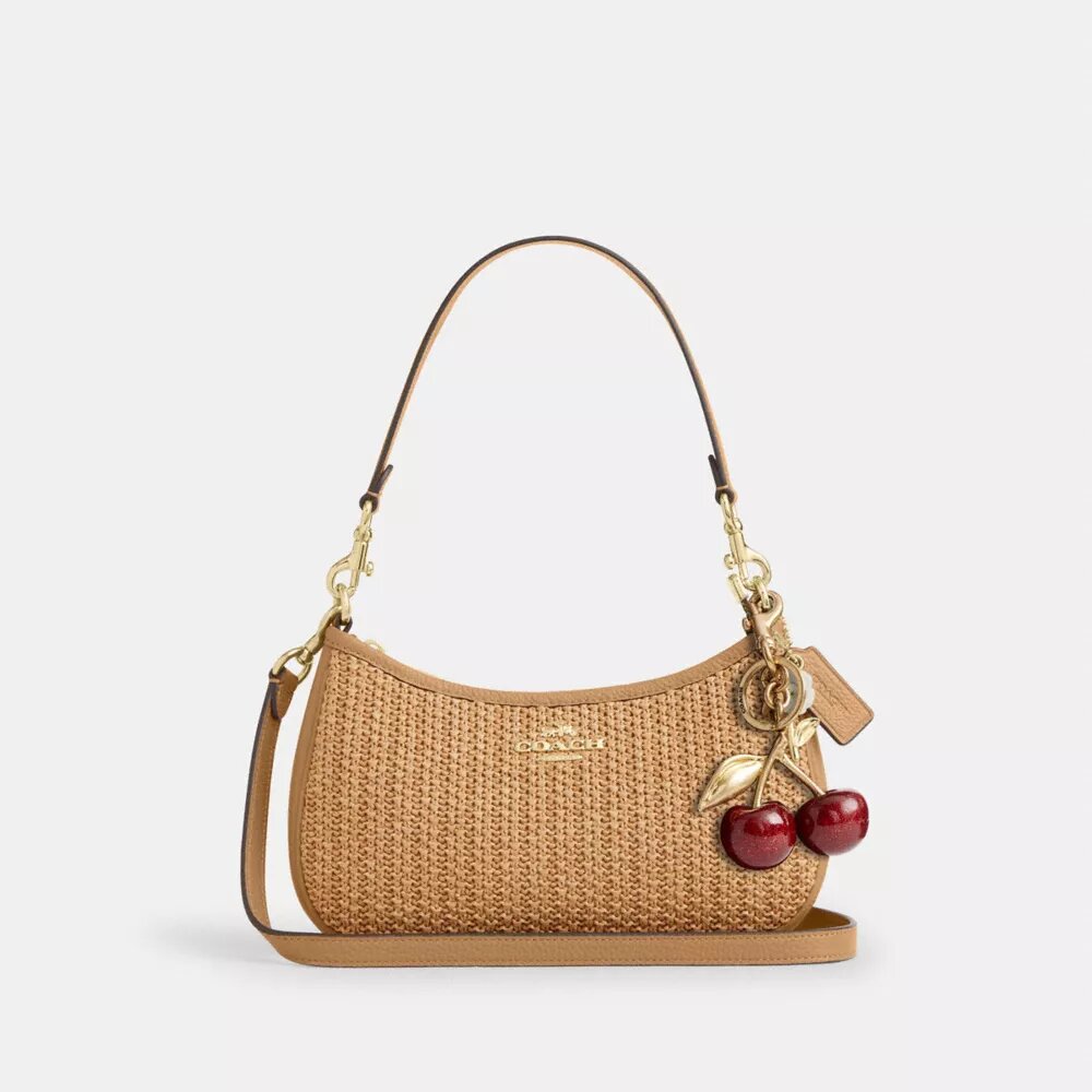 Teri-Schultertasche mit Anhänger