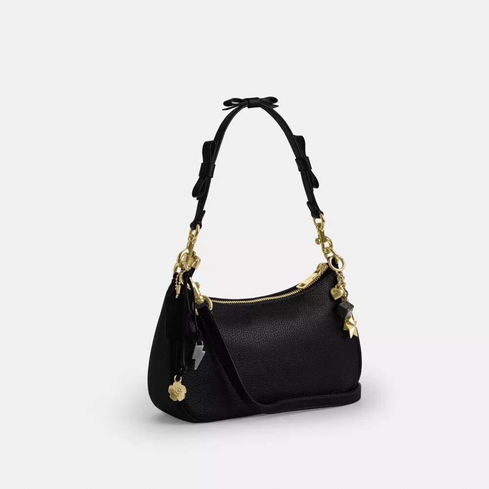 Teri-Schultertasche mit Schleifen und Anhängern