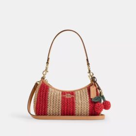 Teri-Schultertasche mit Streifen und Anhänger