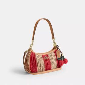 Teri-Schultertasche mit Streifen und Anhänger