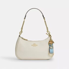Trigger-Snap-Taschenanhänger aus Signature-Leder mit Anhänger