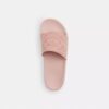 Udele Sport-Pantoletten aus unserem charakteristischen Signature Canvas