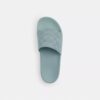 Udele Sport-Pantoletten aus unserem charakteristischen Signature Canvas